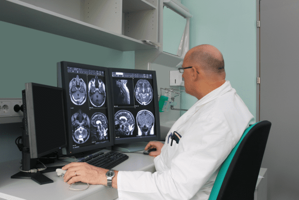 Radiologist is examing MRI scans